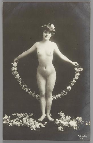 [Standing woman with flower garland]