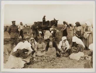 To give employment to the Macedonian women refugees the army service corps has started a potato farm-the women plant the potatos over ground that has been tilled by Bulgar & Turkish prisoners