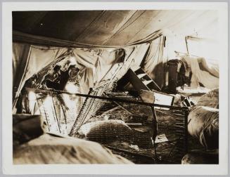 1204. British hospital bombed in Salonica. Another ward; in this case the bomb made a samll (sic) hole between the pollow and the red cross card