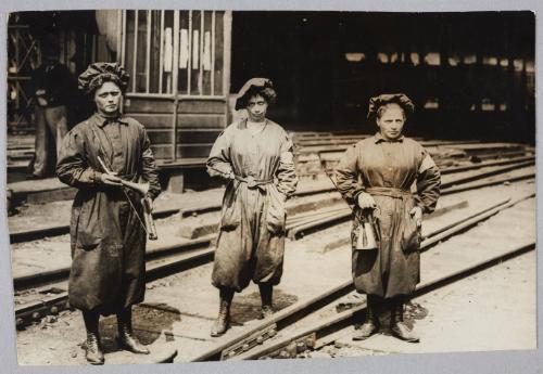 At the Gare du Nord, Paris. Women assume work to supervise maneuvers or to monitor and keep train signals in working order