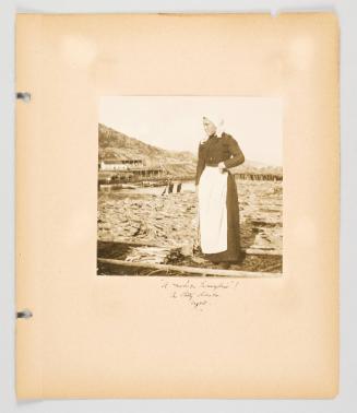 "A modern Evangeline"! In Petty Harbor, Nfld. Page 39 of Fish; from collection of Canadian albums compiled by Edith S. Watson, 1890s-1930s