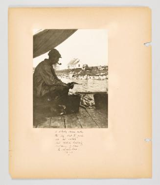 A shady conner under the big sail to work at his catch, and within hailing distance of home! In Sambro, N.S.  Page 16 of Fish; from collection of Canadian albums compiled by Edith S. Watson, 1890s-1930s