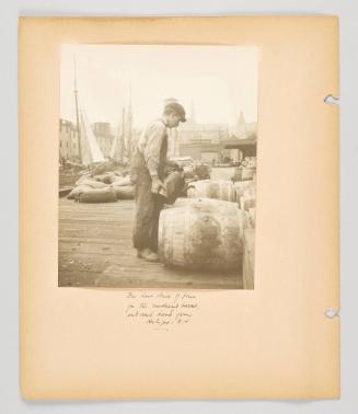 The last drink of brine for the mackerel barrel, outward bound from Halifax, N.S. Page 10 of Fish; from collection of Canadian albums compiled by Edith S. Watson, 1890s-1930s