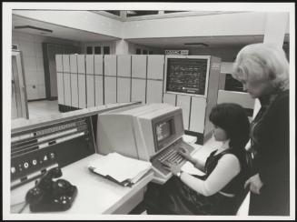 Employees at work at UNIVAC
