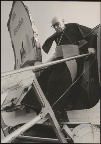 Archbishop Mindszenty descending from an Alitalia plane