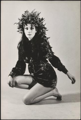 Actress Edwige Fenech poses with a head dress made of leaves