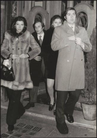 Giovanni Borghi and three companions leave a restaurant 