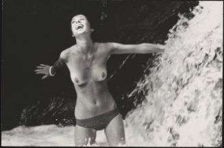 The actress Sonia Ciuffi topless under a waterfall 