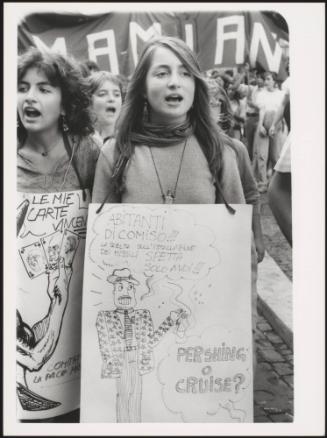 Two young women holding home-made banners against the Pershing nuclear missiles