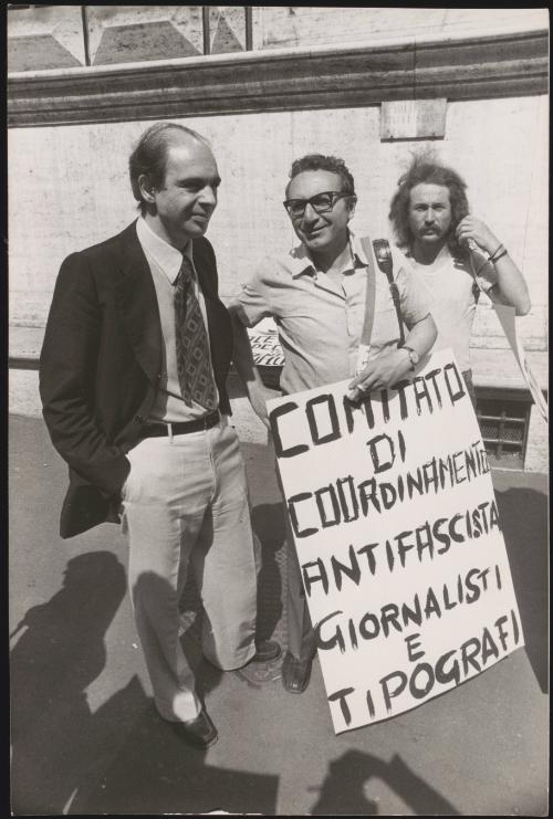 Gianfranco Spadaccia the politician stands with a protestor and his antifascist placard