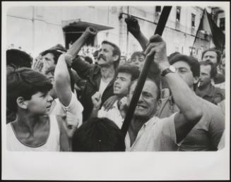 A group of angry young men protesting at an Anti Mafia demonstration