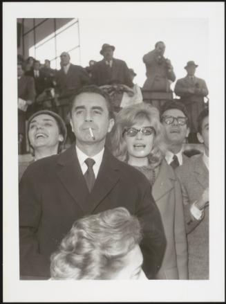 Michelangelo Antonioni with Monica Vitti at the Gala at Capannelle for the horse-racing in 1962