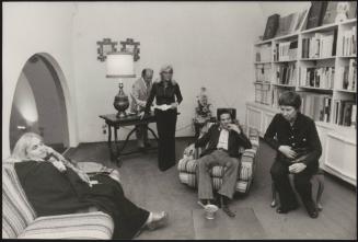 Laura Betti, Pier Paolo Pasolini and Serge Gainsbourg in the sitting room of a large house