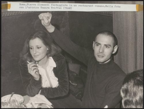 Pierre Clementi celebrates his freedom from prison and the courts in a restaurant in Rome. Pictured with actress Tamara Triffez 
