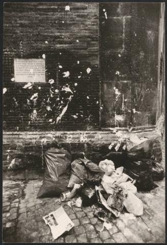 Rubbish on a street corner in Rome,  Via Arco Della Pace