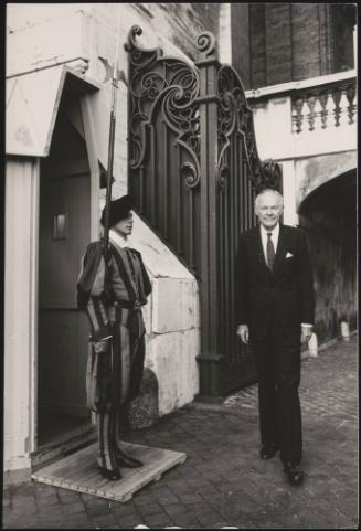 U.S. senator Henry Cabot Lodge Jr. outside palace gates