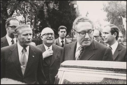 John Volpe, Mariano Rumor and Henry Kissinger getting into a car 