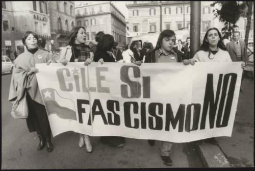 Anti Pinochet protesters with a banner