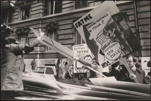 Protesters hand out placards 