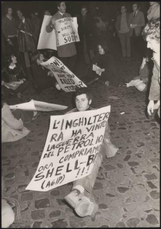 Young protesters with placards
