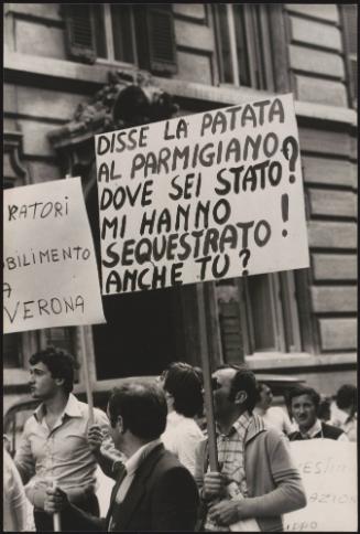 Placards raised at a food producer's demonstration