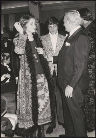 Vittorio De Sica, Lino Capolicchio, Dominique Varaigne at a party