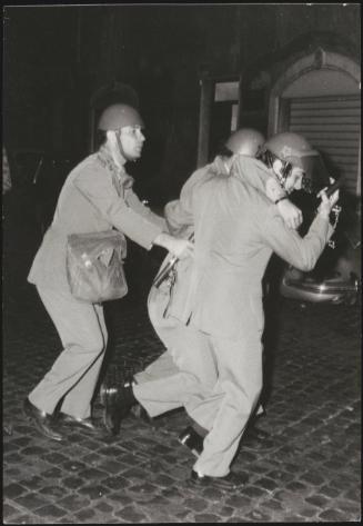 Riot police at night