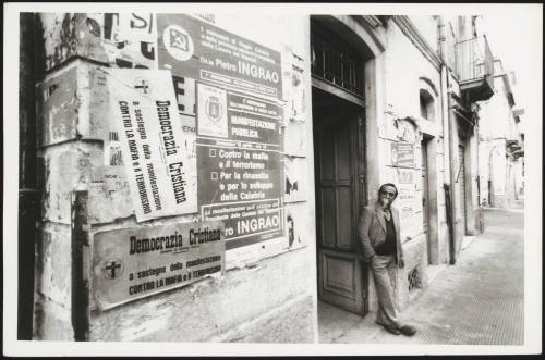 Posters on the street promoting the Christian Democrats' and the Communist Party's support of the demonstration against the Mafia and terrorism, in Reggio Calabria