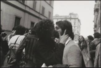 Two men kissing during a gay rights demonstration 