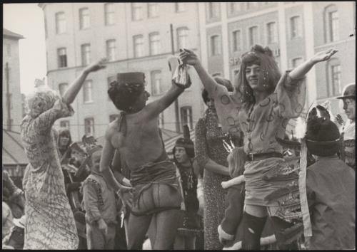 At the carnival in fancy dress and drag