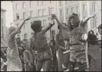 At the carnival in fancy dress and drag