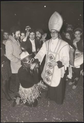 Carnival-goers in fancy dress