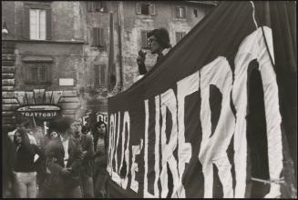 Achille Lollo leads a demonstration 