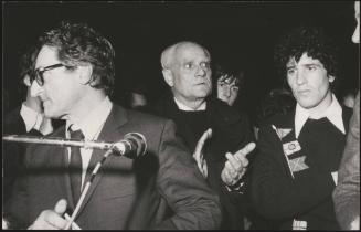 Politician Aldo Tortorella, writer Alberto Moravia and actor Ninetto Davoli photographed at the funeral of Pier Paolo Pasolini