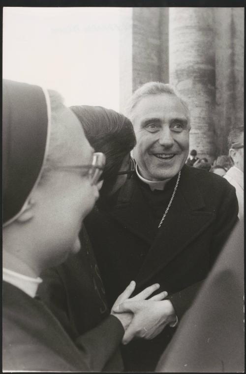 Cardinal Eduardo Francisco Pironio in the company of nuns and others