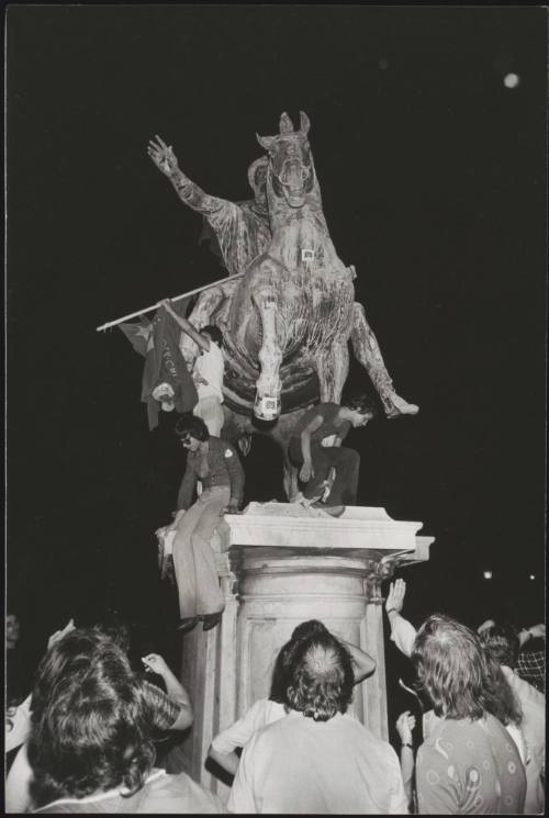 Young Communist demonstrators on the statue of Marcus Aurelius in the Piazza del Campidoglio, Rome
