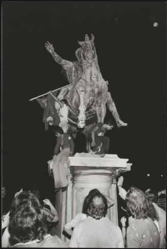 Young Communist demonstrators on the statue of Marcus Aurelius in the Piazza del Campidoglio, Rome