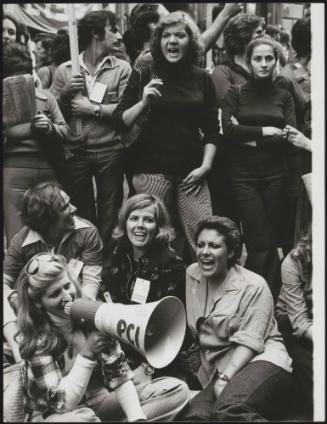 Group of women from the 'Servizio D'Ordine' (Communist party members in charge of keeping order during demonstrations) using a megaphone at a Trade Union demonstration in Rome