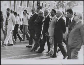 Prominent Communist politicians walk in a sombre line after the funeral of Pietro Secchia, an important member of the Italian Communist Party, who died after a long illness in July 1973. From left, they are Paolo Bufalini, Giancarlo Pajetta, Armando Cossutta, Umberto Terracini, Enrico Berlinguer and Emilio Sereni