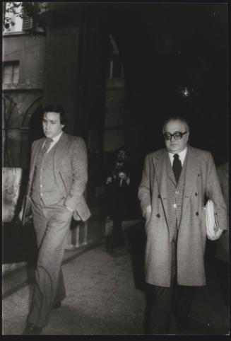 PCI politicians Claudio Signorile and Gerardo Chiaromonte leaving government meetings at the headquarters of the Christian Democratic Party, where the economy was discussed by the 6 parties