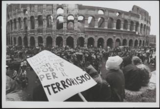 Textile workers gather to demonstrate outside the Colosseum in Rome 