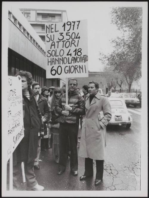 Actors Pino Caruso and  Gianni Garko picket a cinema in a demonstration about the lack of work for Italian actors in the film industry 