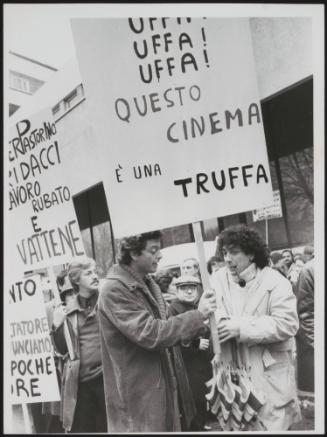 A small crowd including actor Andrea Giordana, picket a cinema in a demonstration about the Italian film industry 