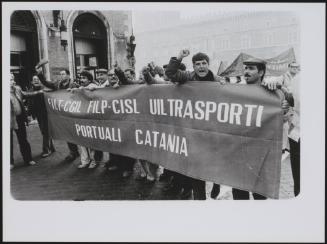 A demonstration by Sicilian transport workers in the city of Catania, on Sicily's east coast. FILT-CGIL and FILP-CISL are port workers' unions, under the Italian Federation of Transport Workers.