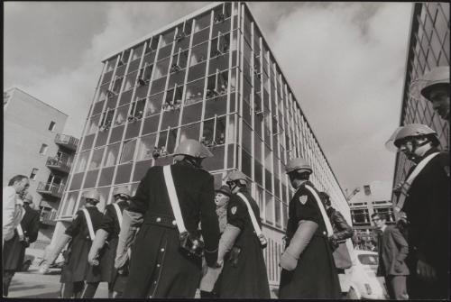 Riot police arrive at an area of unrest in Rome