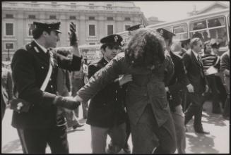 A member of the Radical Party is taken away by the police