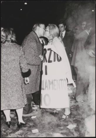 A couple kiss among proponents of the Italian divorce law demonstrating for its adoption in parliament