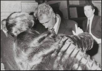 The family of plane-jacker Raphael Minichiello comforting one another, his father Luigi Antonio in the centre