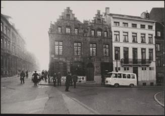 Belgian police awaiting the arrival of British Prime Minister Harold Macmillan