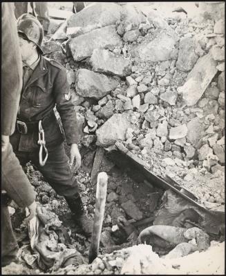 A body trapped in the rubble in the aftermath of the Friuli earthquake